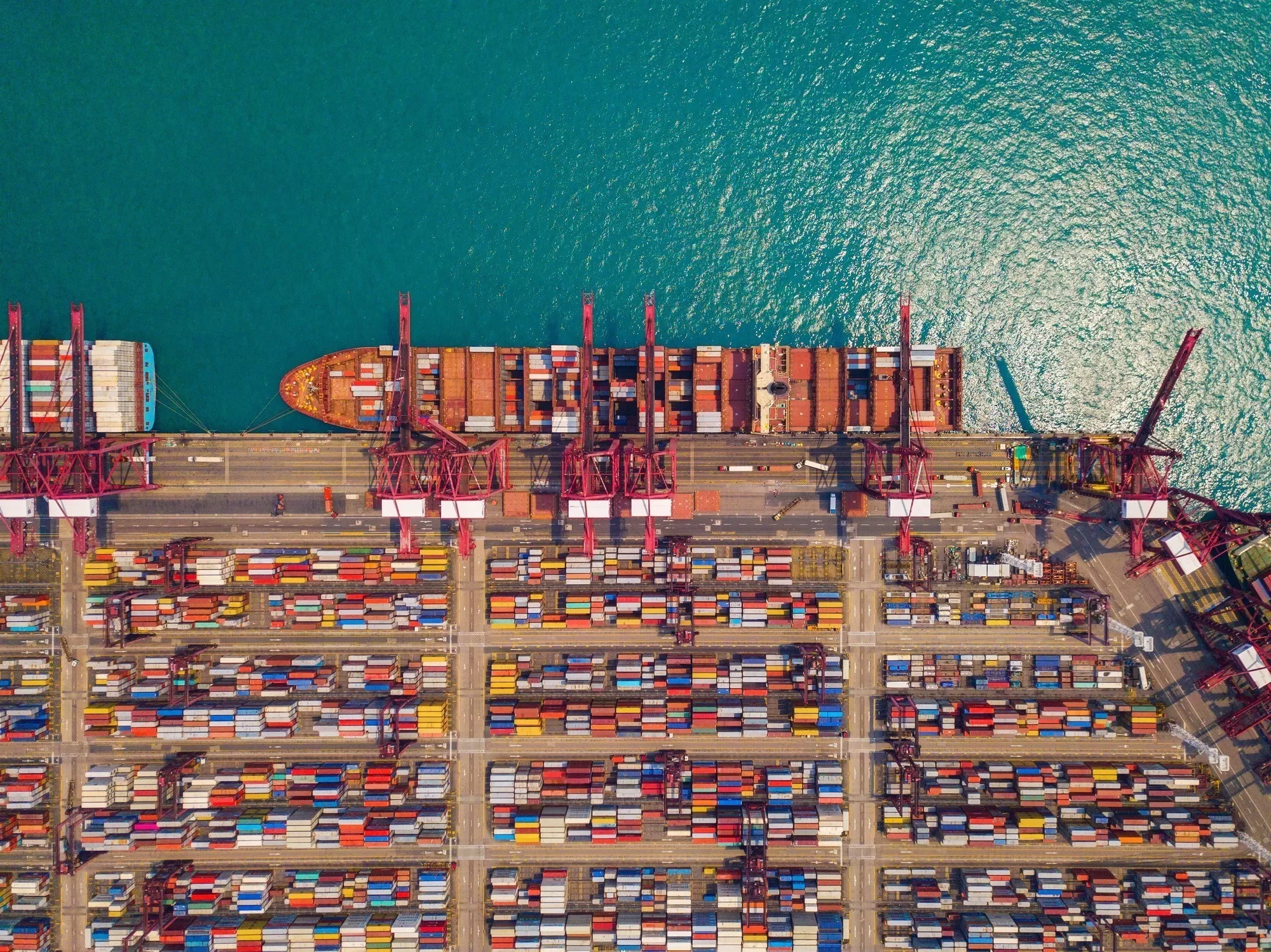container cargo ship in the export and import business and logistics. Shipping to the harbor